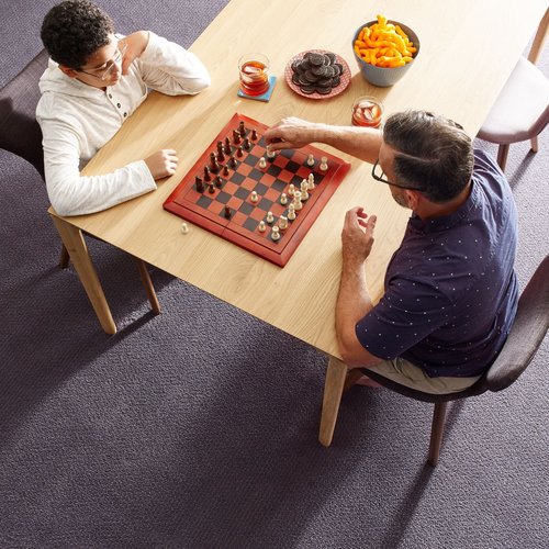 People playing chess - Clifton's Carpet Shop in MO