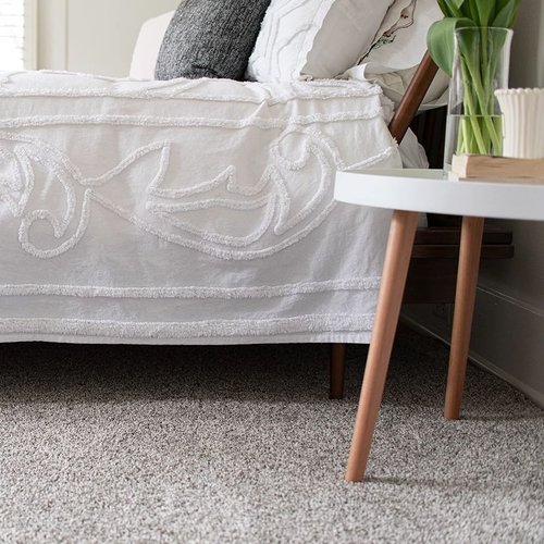 Bed and coffee table - Clifton's Carpet Shop in MO